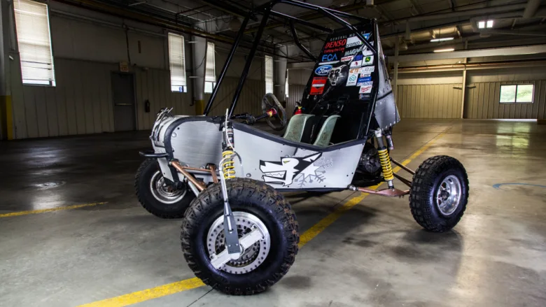 Michigan Tech single-seat off-road Baja car in a workshop