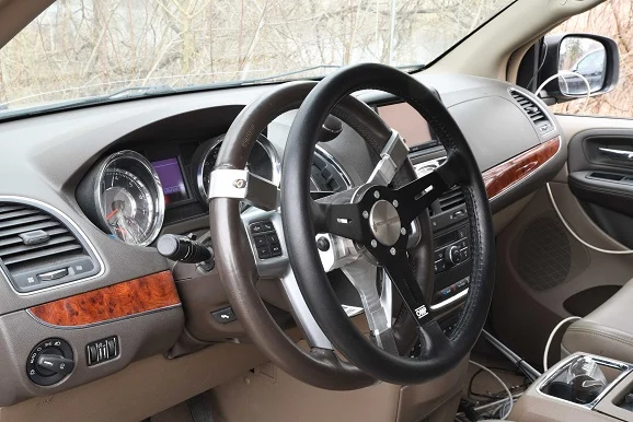 Steering wheel torque transducer installed in a vehicle