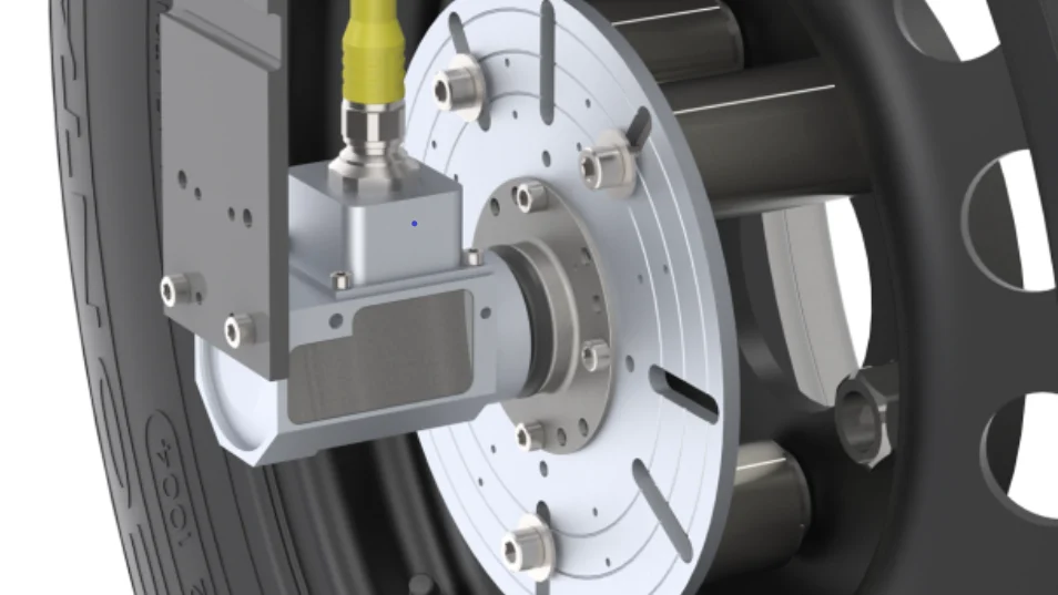 Rendering of a slip ring assembly on its adapter plate, bolted outboard on a vehicle wheel